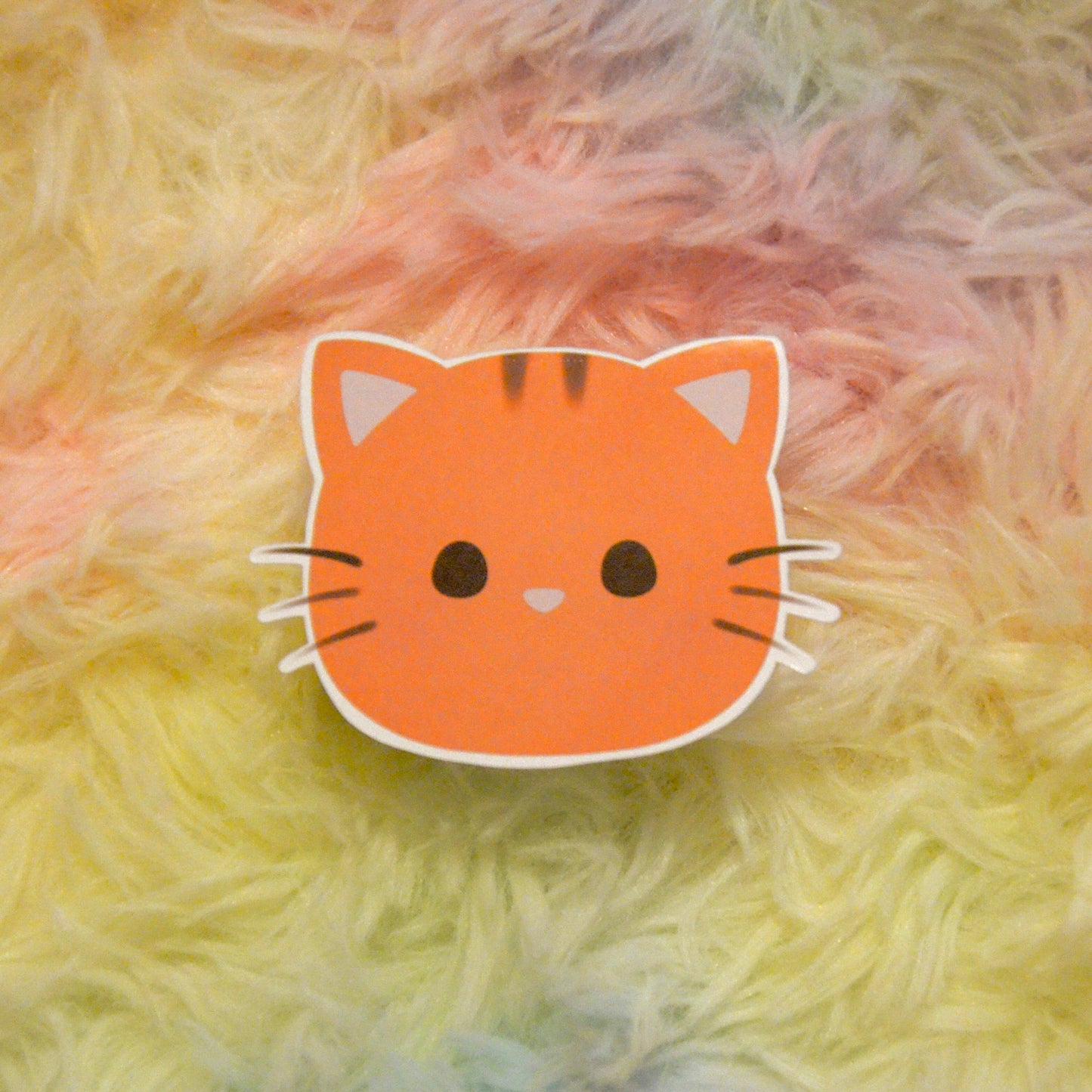 Taffy head sticker against rainbow background