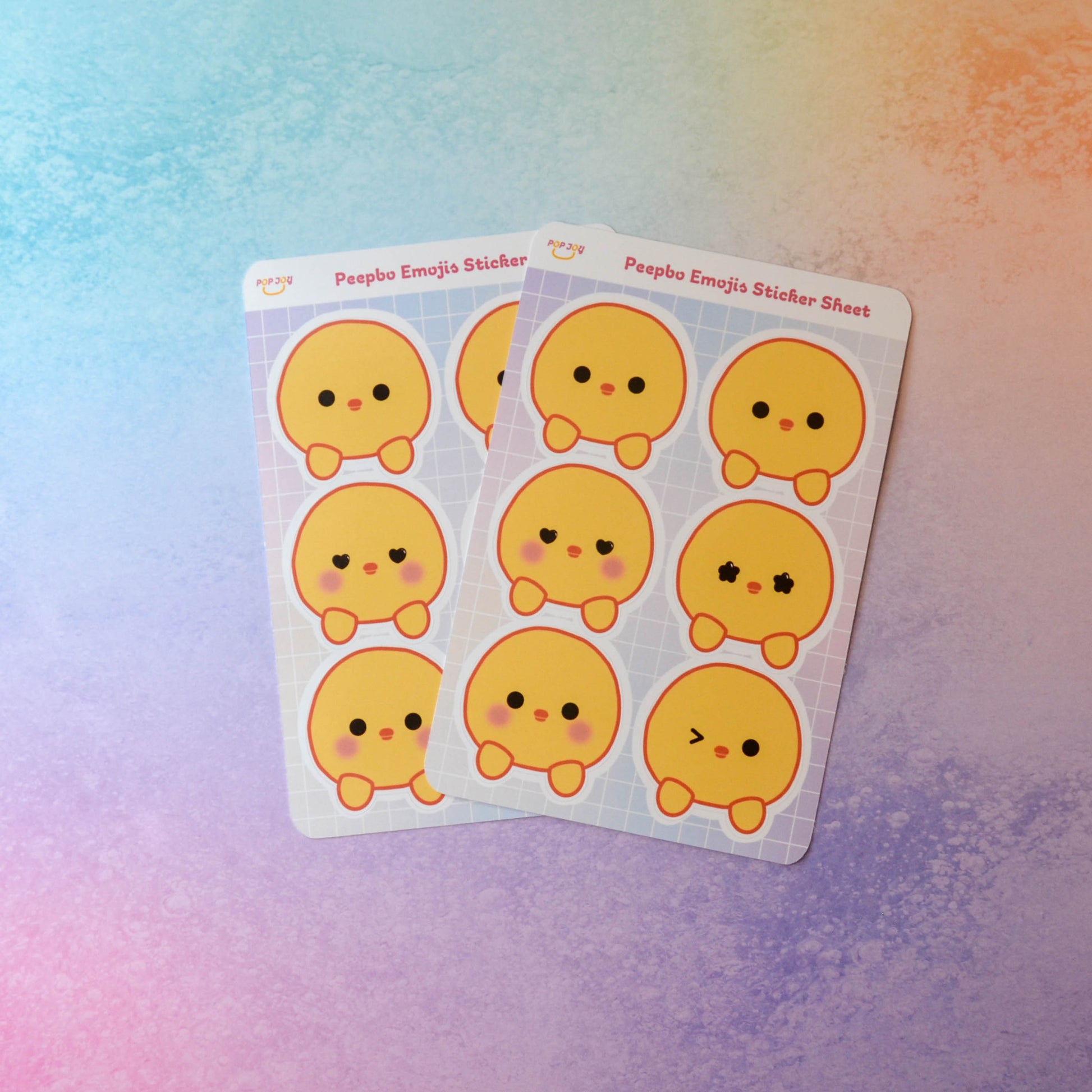 2 Peepbo Emojis Sticker Sheets on pastel rainbow background