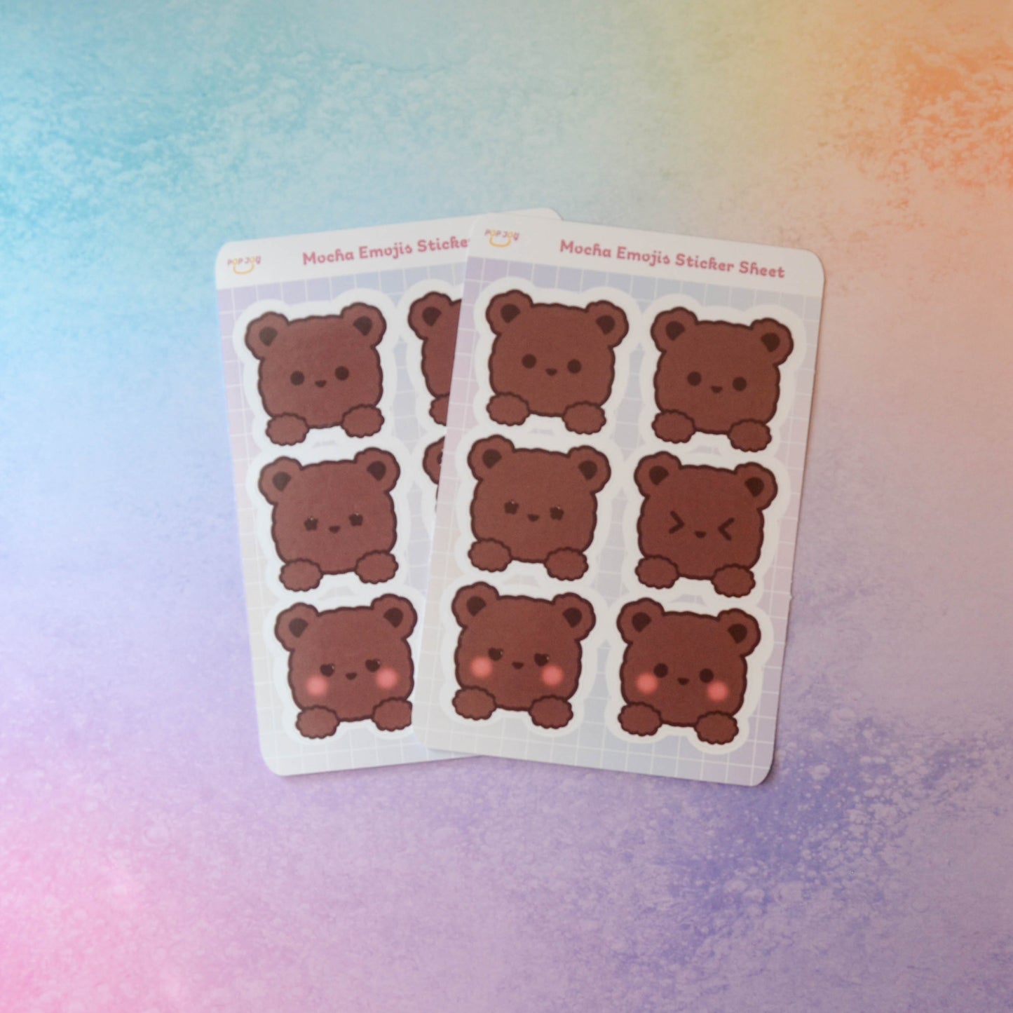 2 Mocha Emojis Sticker Sheets on pastel rainbow background