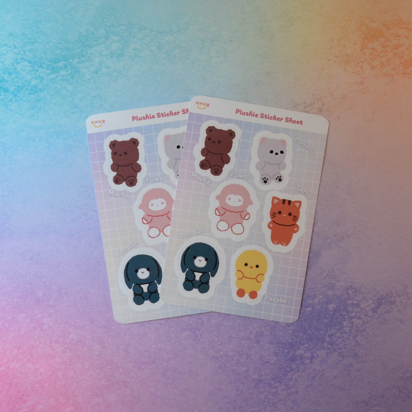 2 Plushie Sticker Sheets on pastel rainbow background