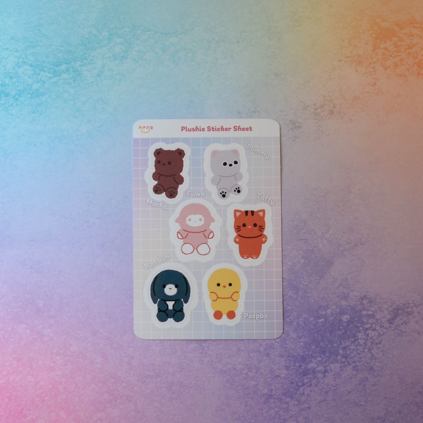 Plushie Sticker Sheet on pastel rainbow background