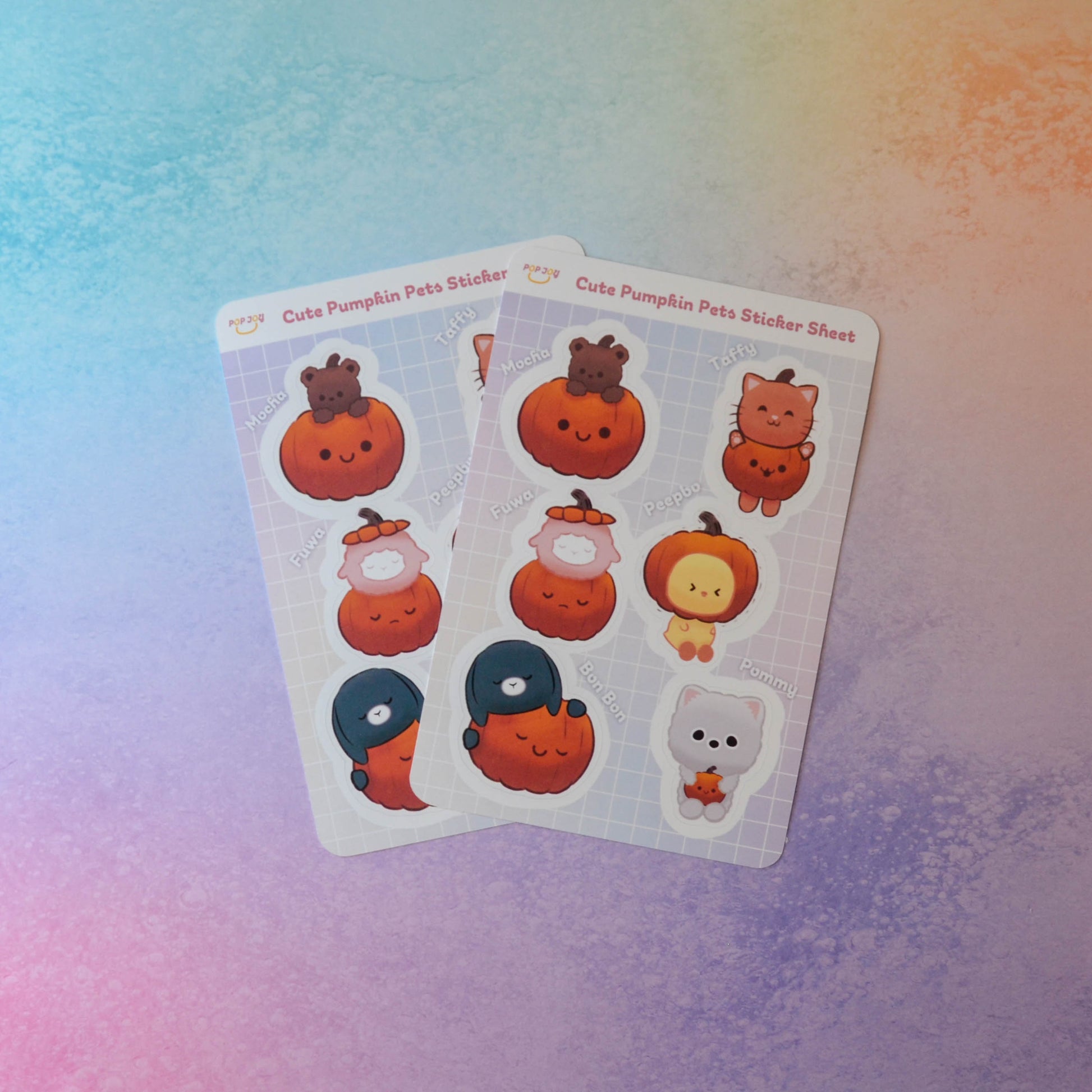 2 Cute Pumpkin Pets Sticker Sheets on pastel rainbow background